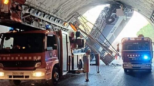 Bus carrying 60 passengers overturns in Spain
