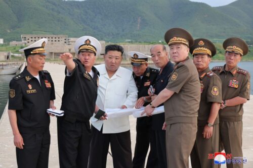 Kim Jong Un looks at naval base construction works