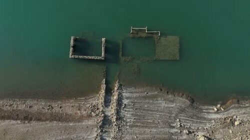 Sunken Greek village re-emerges from lake after extreme heat
