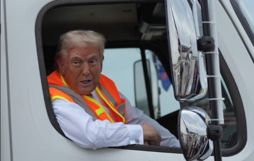 Trump climbs into garbage truck cab ‘in honor of Kamala and Joe Biden’