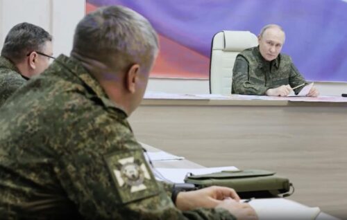 Putin appears in military uniform at command post in Kursk giving orders