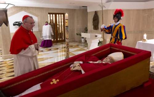 Vatican releases photos of Pope Francis in open coffin