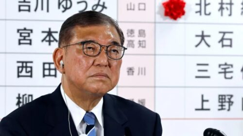Japan’s prime minister vows to stay in office despite crushing election defeat