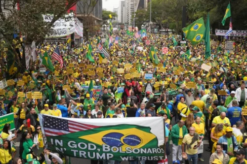 Thousands of supporters rally in defense of Brazil’s former president ahead of coup trial